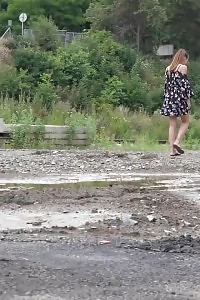 Beautiful Black-haired Yenna Squats And Pissing In A Puddle