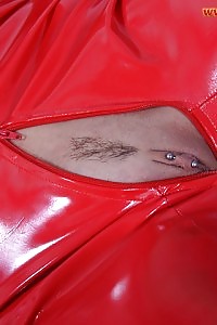 Flawless Leslie Unzips Her Latex Red Costume