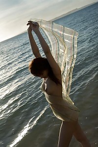 Lovely Flirtatious Asian Girl Flaunts Her Nubile Nude Ass To The Cams