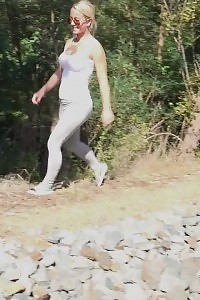 Flirtatious European Pisses Over The Railway Line