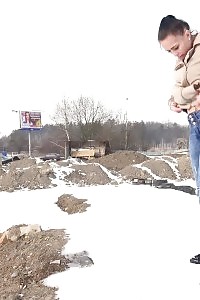 Magnificent Girl Squats In The Snow And Pisses Outside
