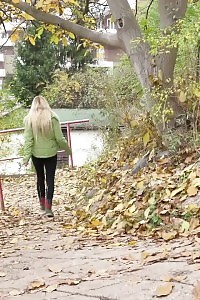 Blonde Displays Tattoes As She Pissing Outside