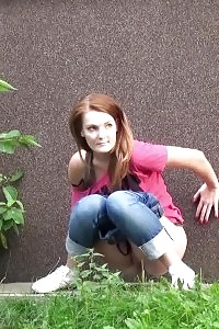 Red-haired Squats Right Down To Pee