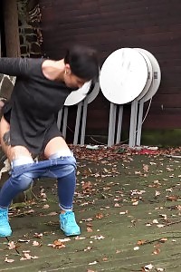 Lovely Girl In Sneakers Squats To Piss Outside