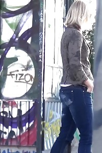 Blonde Has Fun As She Pissing While Standing
