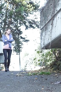 Good-looking Babe Pees Outside In The Mid Of A Road