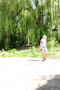Blonde With Tattoes Sprays Her Pee On The Ground